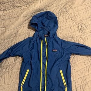 Patagonia Blue Jacket with Yellow Zippers